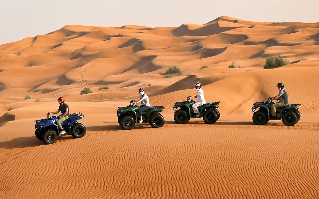 Dubai: Bike the Red Dunes, Camel Rides, Sandboarding and BBQ