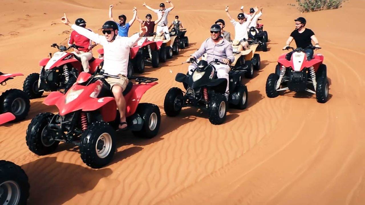 Dubai: Bike the Red Dunes, Camel Rides, Sandboarding and BBQ